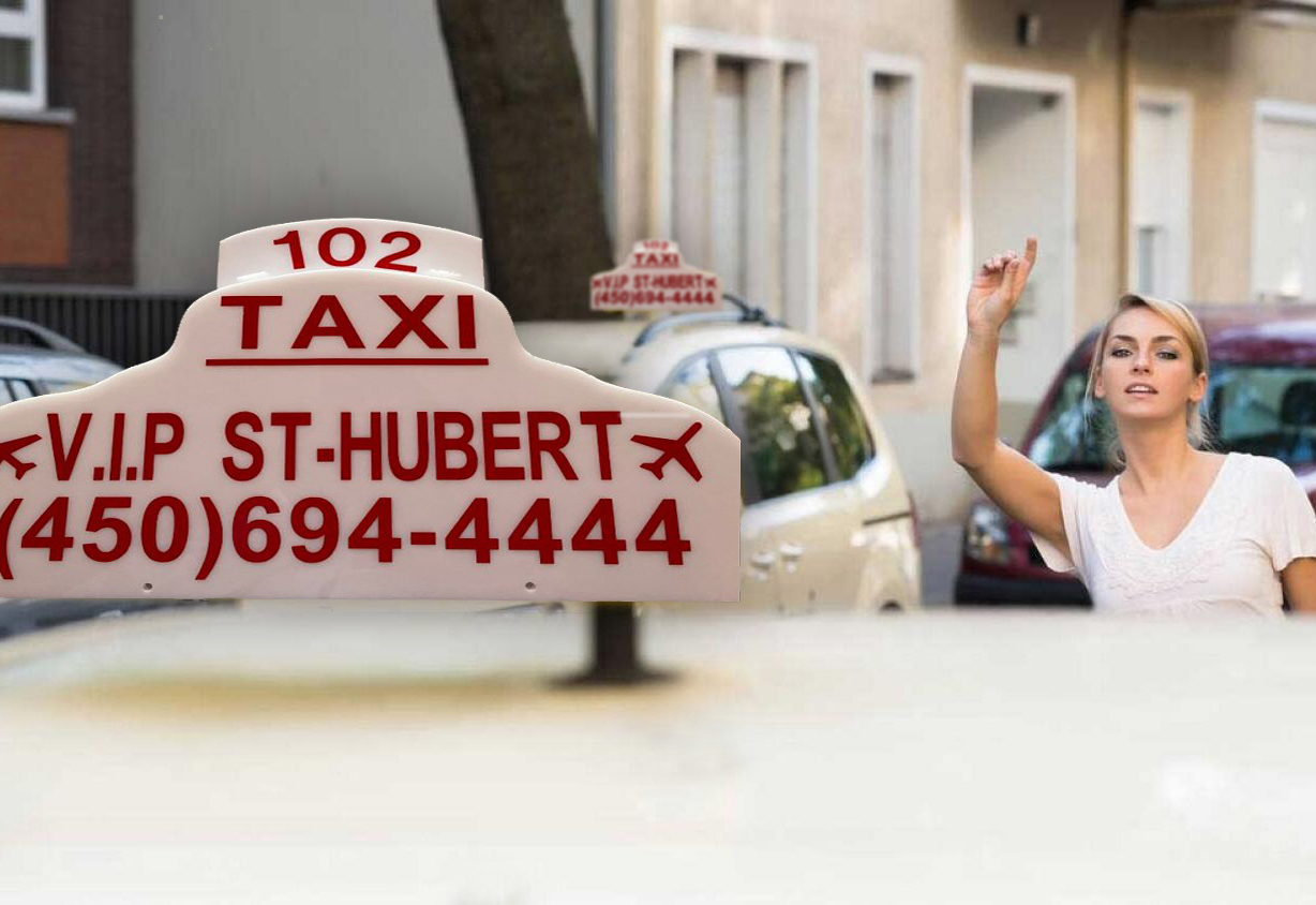 R43JBH Woman Raising Arm To Hail Taxi On Street